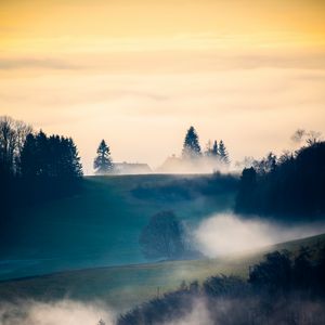 Preview wallpaper hills, trees, fog, clouds, landscape