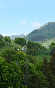 Preview wallpaper hills, trees, houses, sky, nature