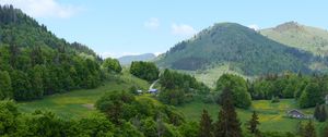 Preview wallpaper hills, trees, houses, sky, nature