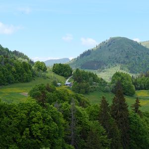 Preview wallpaper hills, trees, houses, sky, nature