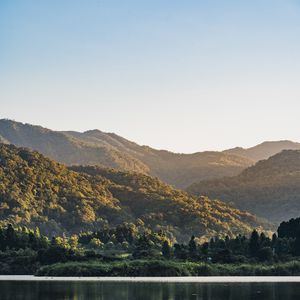 Preview wallpaper hills, trees, lake, reflection, landscape