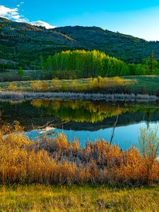 Preview wallpaper hills, trees, lake, grass, landscape, nature