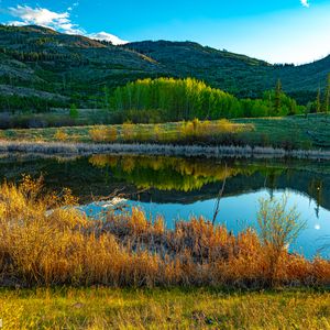 Preview wallpaper hills, trees, lake, grass, landscape, nature