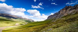 Preview wallpaper hills, valley, clouds, landscape, nature