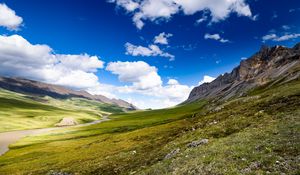 Preview wallpaper hills, valley, clouds, landscape, nature