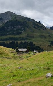 Preview wallpaper hills, valley, grass, house, trees