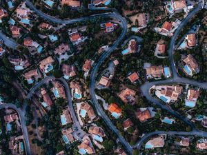 Preview wallpaper homes, road, winding, aerial view