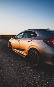 Preview wallpaper honda, car, gray, track, sunset