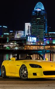 Preview wallpaper honda s2000, honda, car, yellow, city, lights, night