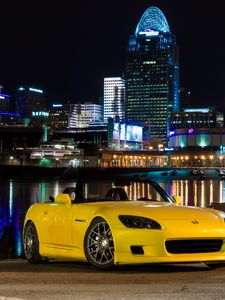 Preview wallpaper honda s2000, honda, car, yellow, city, lights, night