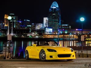 Preview wallpaper honda s2000, honda, car, yellow, city, lights, night