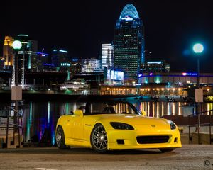 Preview wallpaper honda s2000, honda, car, yellow, city, lights, night