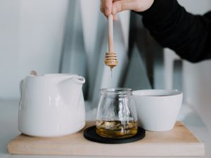 Preview wallpaper honey, cup, kettle, hand