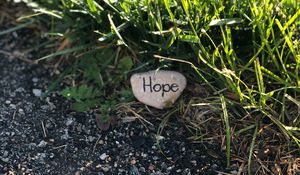 Preview wallpaper hope, inscription, grass, stone