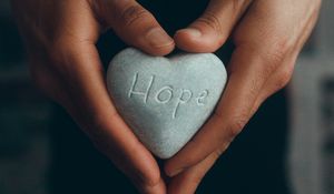 Preview wallpaper hope, inscription, stone, heart, hands, word