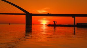 Preview wallpaper horizon, sunset, bridge, reflection, orange