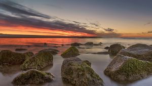 Preview wallpaper horizon, sunset, stones, shore