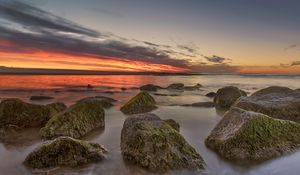 Preview wallpaper horizon, sunset, stones, shore
