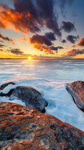 Preview wallpaper horizon, sunset, stones, ice, snow