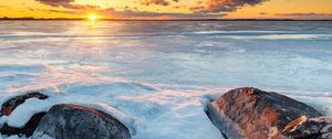 Preview wallpaper horizon, sunset, stones, ice, snow