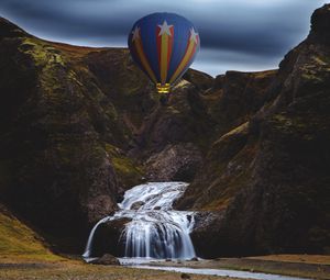 Preview wallpaper hot air balloon, mountains, rocks, waterfall