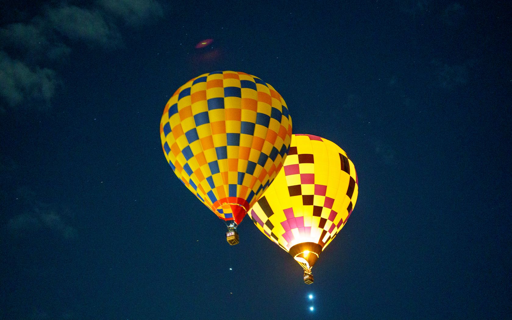 1680x1050 Wallpaper hot air balloon, travel, clouds, sky, flight, height, dark