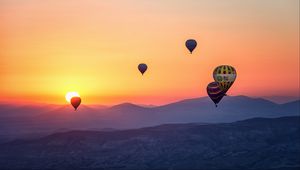 Preview wallpaper hot air balloons, mountains, sunrise, fog