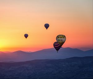 Preview wallpaper hot air balloons, mountains, sunrise, fog