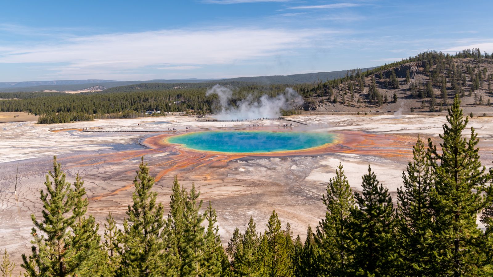 Download wallpaper 1600x900 hot springs, crater, water, steam, trees