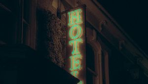 Preview wallpaper hotel, inscription, neon, backlight, building, dark