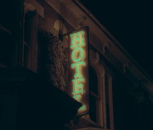 Preview wallpaper hotel, inscription, neon, backlight, building, dark