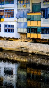 Preview wallpaper house, balconies, facade, water, colorful