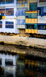 Preview wallpaper house, balconies, facade, water, colorful