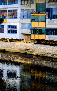 Preview wallpaper house, balconies, facade, water, colorful