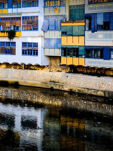 Preview wallpaper house, balconies, facade, water, colorful