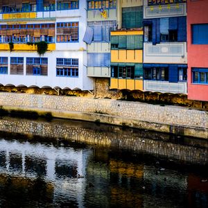 Preview wallpaper house, balconies, facade, water, colorful