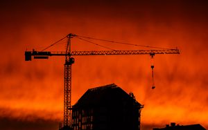 Preview wallpaper house, building, crane, silhouette, sunset, dark