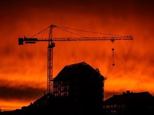 Preview wallpaper house, building, crane, silhouette, sunset, dark