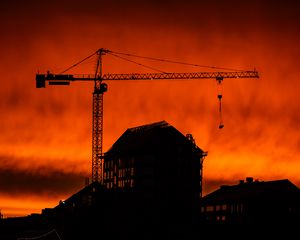 Preview wallpaper house, building, crane, silhouette, sunset, dark