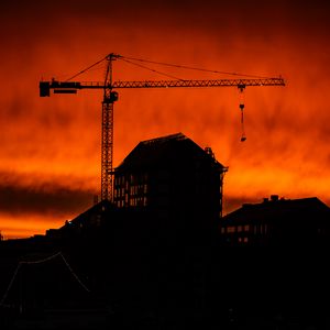 Preview wallpaper house, building, crane, silhouette, sunset, dark