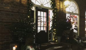 Preview wallpaper house, door, garlands, decorations, night, new year