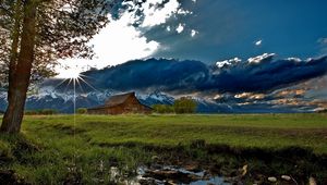 Preview wallpaper house, field, clouds, shadows, light, sun, beams, tree