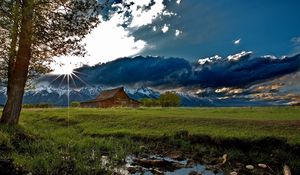 Preview wallpaper house, field, clouds, shadows, light, sun, beams, tree