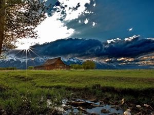 Preview wallpaper house, field, clouds, shadows, light, sun, beams, tree