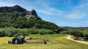 Preview wallpaper house, field, mountains, sky, nature