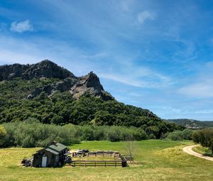 Preview wallpaper house, field, mountains, sky, nature