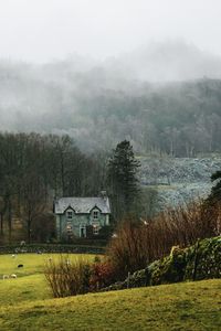 Preview wallpaper house, fog, grass, landscape, village