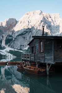 Preview wallpaper house, lake, boats, pier, mountains