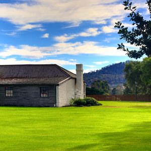 Preview wallpaper house, lawn, pipe, sky