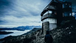 Preview wallpaper house, man, hood, alone, solitude, mountains, christchurch, new zealand